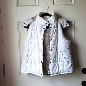Never worn Bongo puffer vest with skulls